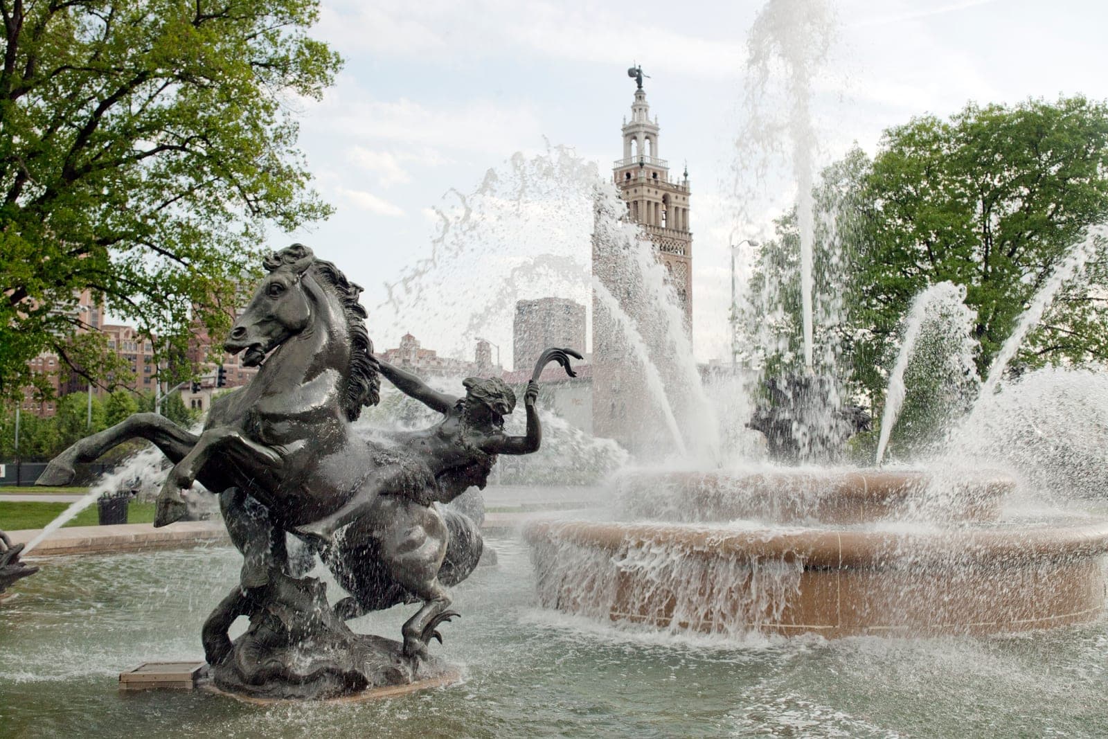 Bronze horses and riders rise from the spray of a fountain near the Country Club Plaza in Kansas City, Missouri
